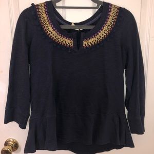 Embroidered navy top from Anthropologie